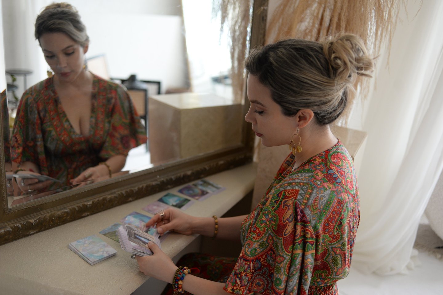 artist and actor using oracle cards