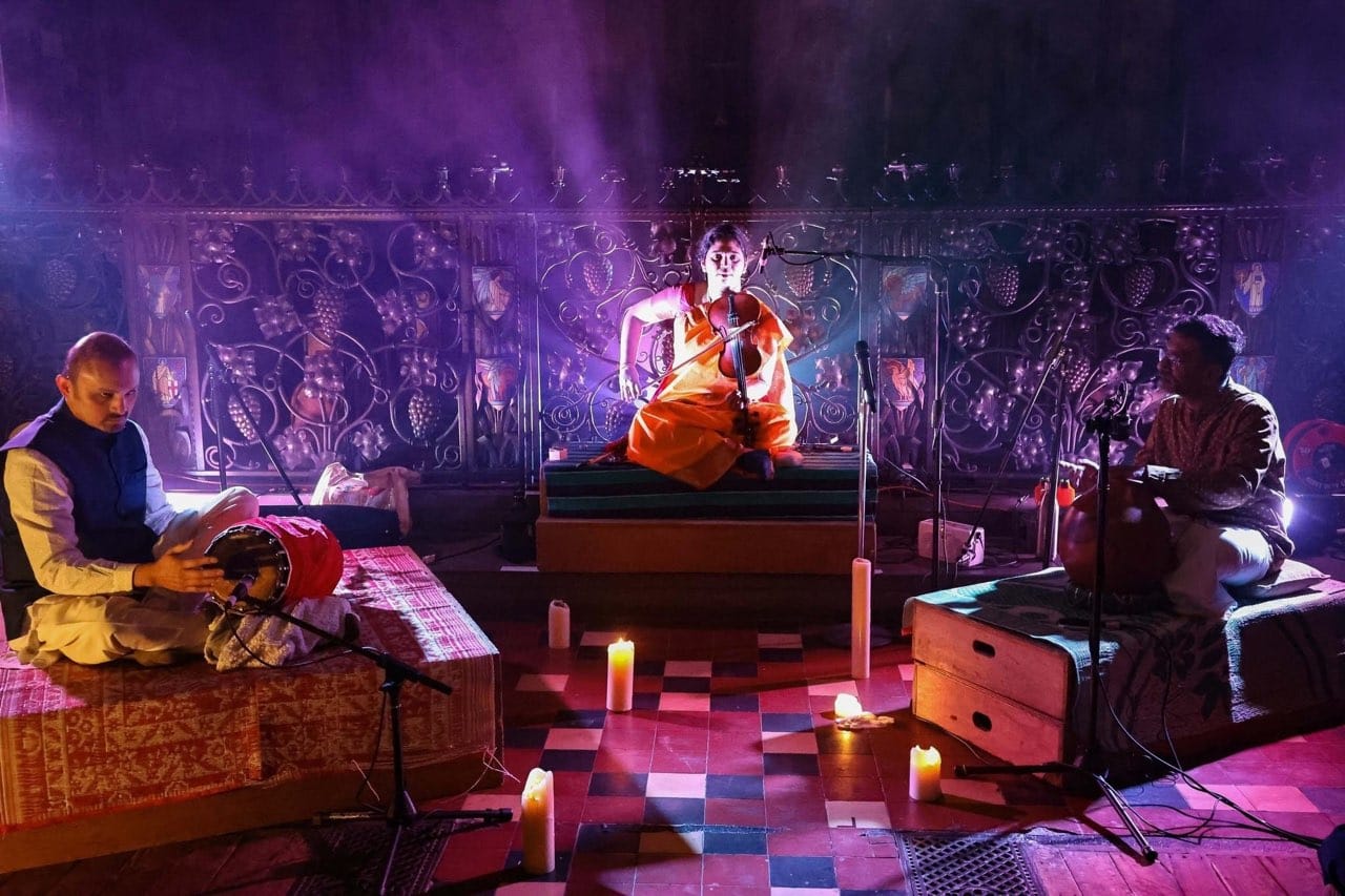 A picture of artists performing in a stage
