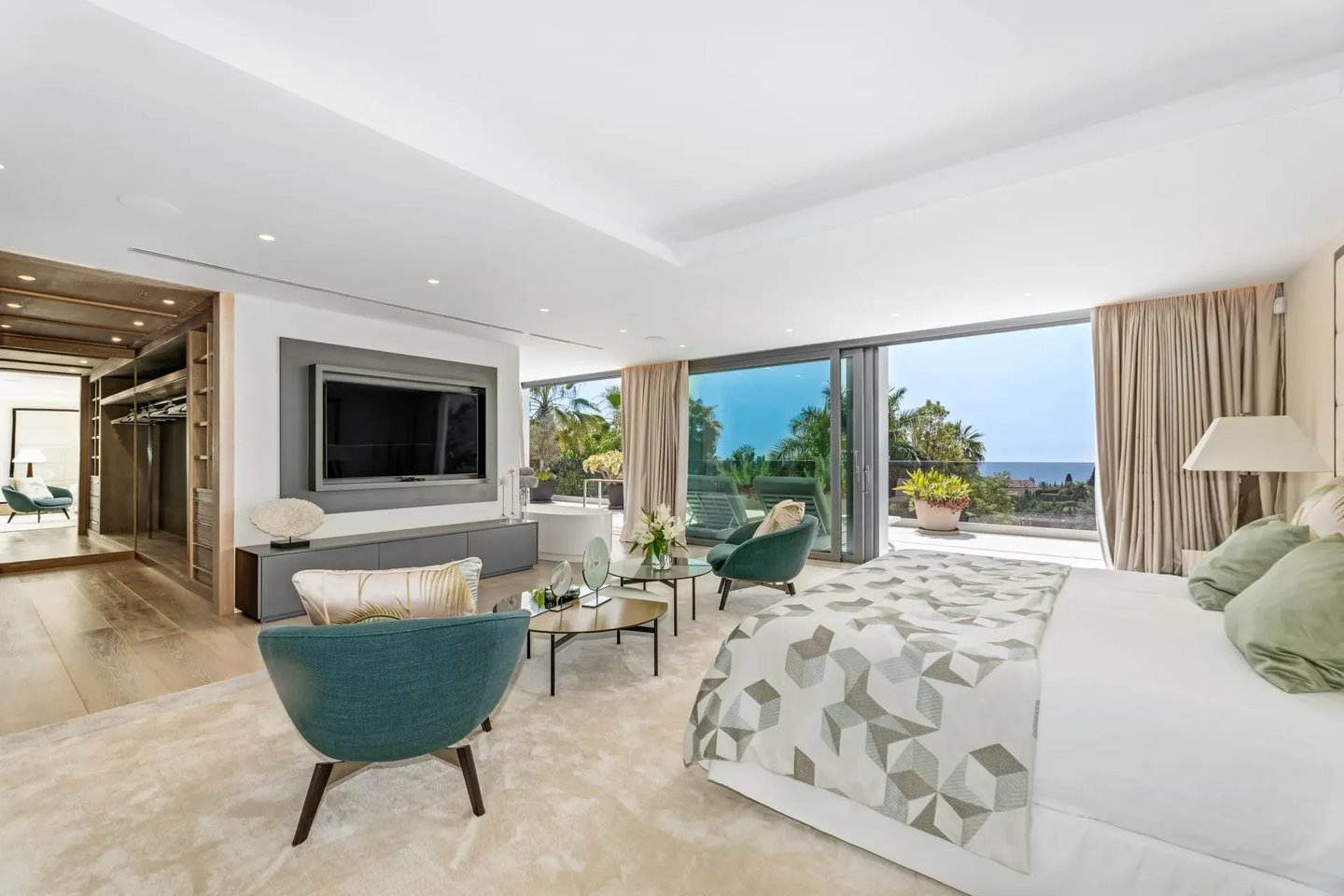 Elegant suite with seating and terrace at Villa Serenity