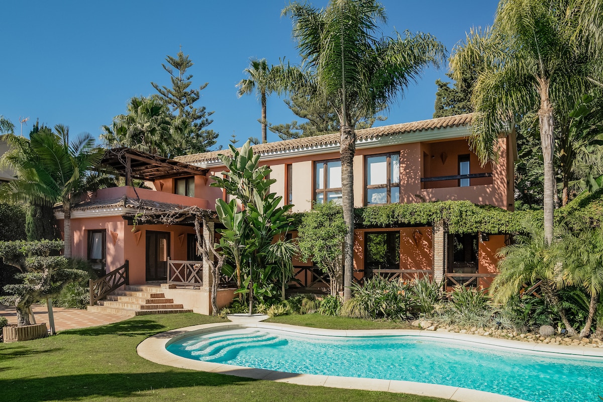 Exterior view of the two-villa estate with landscaped gardens on Marbella's Golden Mile