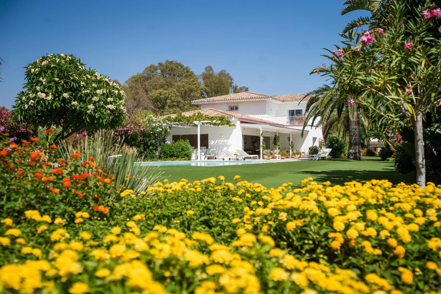 Andalusian style villa surrounded by landscaped gardens