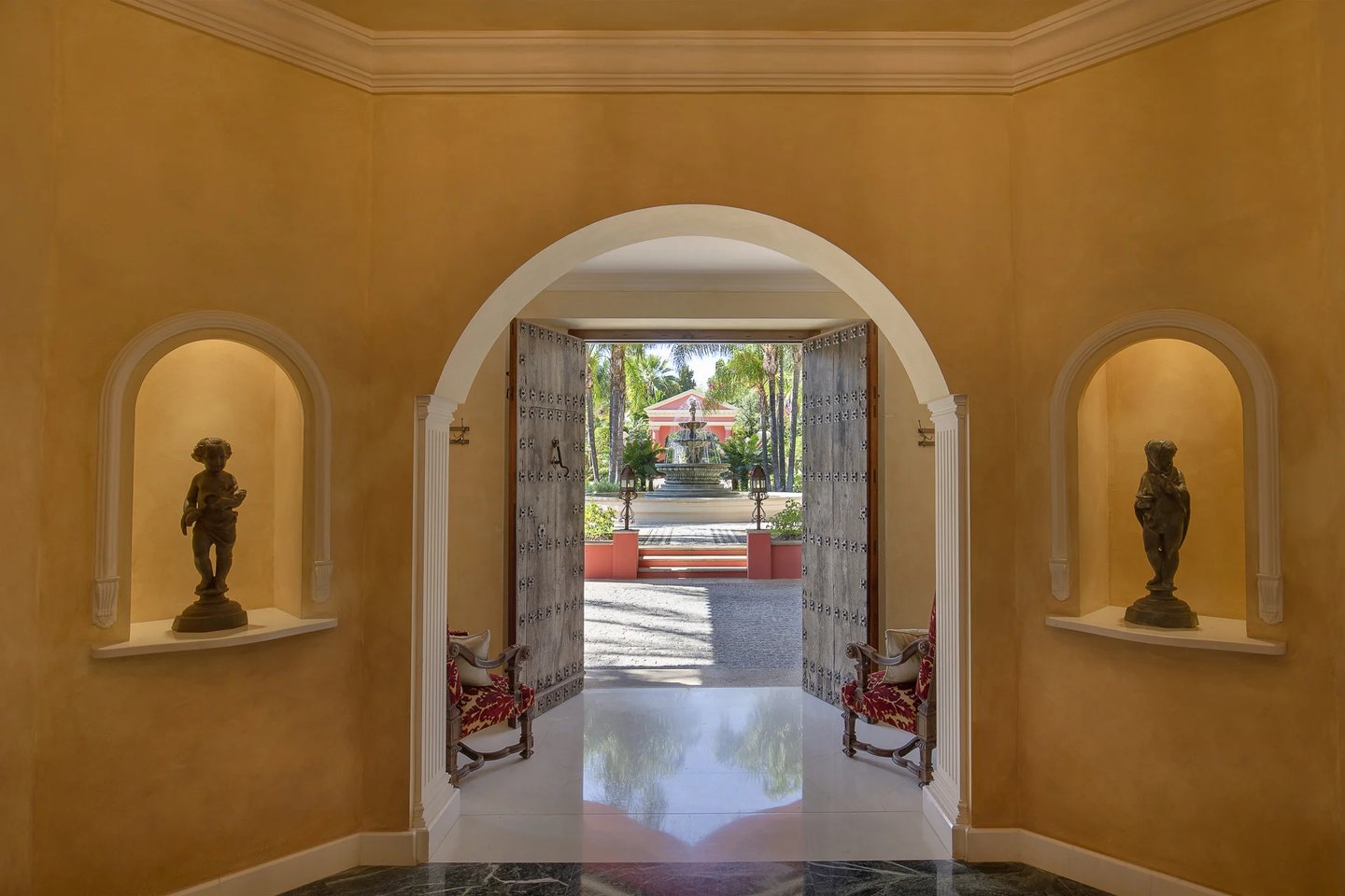 Grand entrance hall connecting the villa's main reception areas