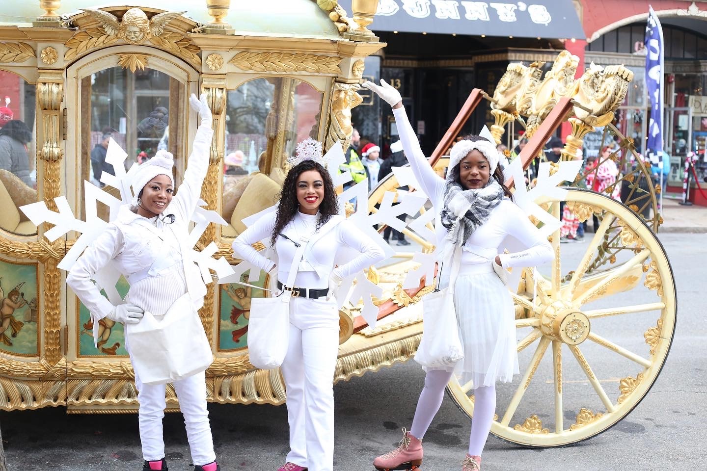 Snowflake skaters posing during a parade
