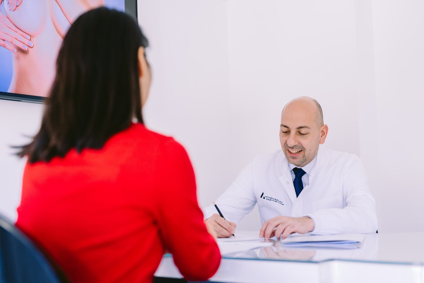 Prof Marios Papadakis during patient consultation at Athenaeum Aesthetics