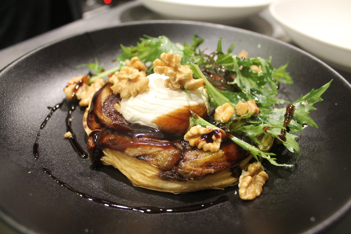 a plate of food with a savoury tatin
