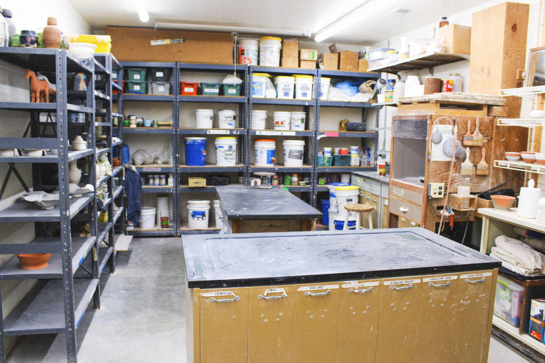 Image of our Moss Street studio glaze room which also houses many of our dry materials.