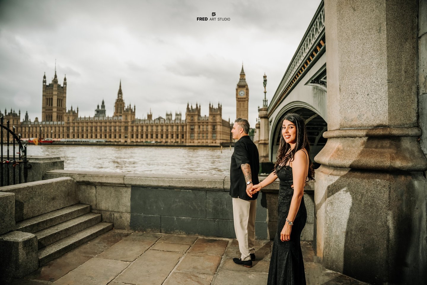 Couple by the River Thames with Westminster view, captured by Fred Art Studio.