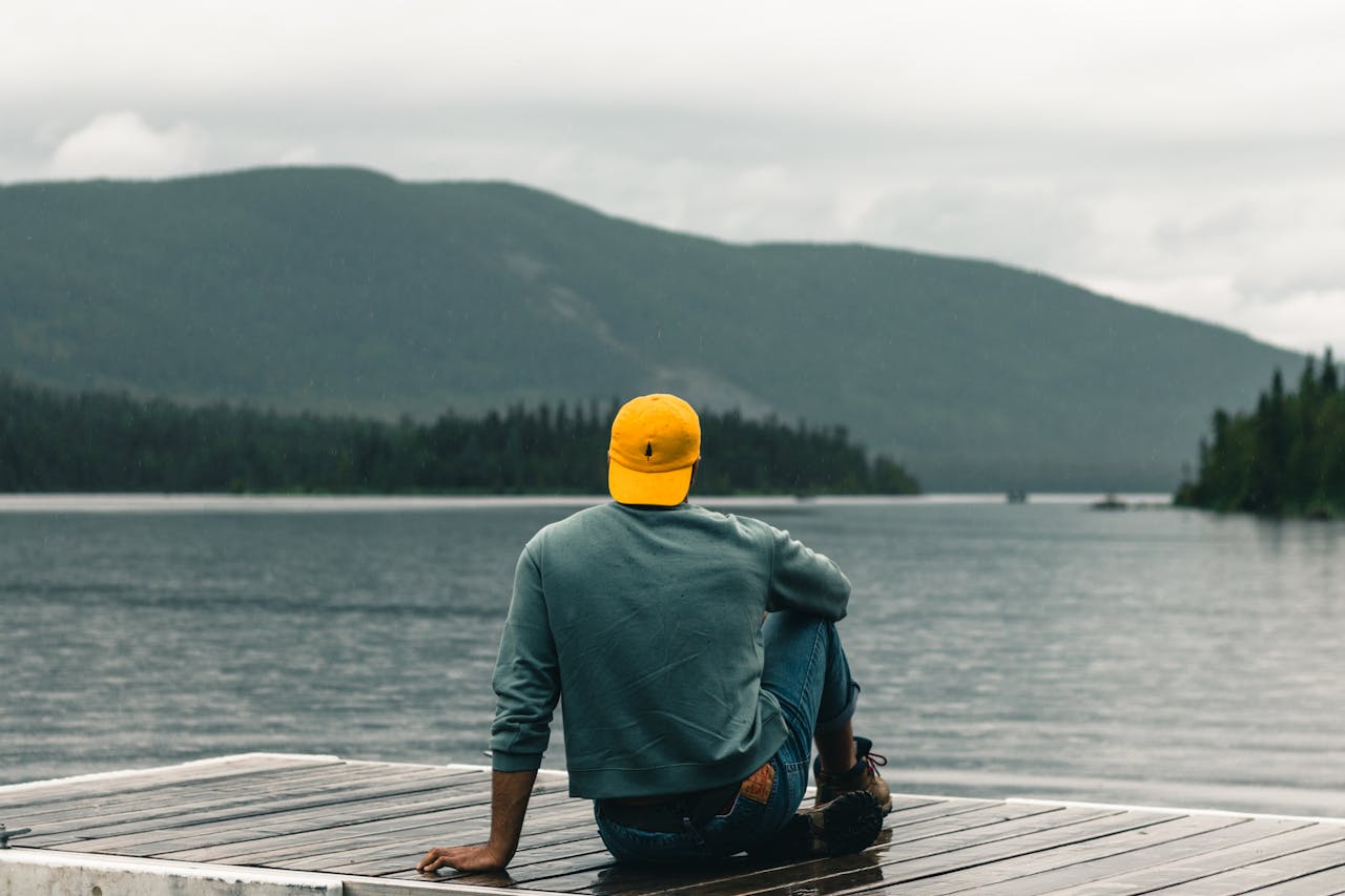 Photo by Ali Kazal: https://www.pexels.com/photo/man-sitting-on-a-promenade-and-looking-at-the-horiz