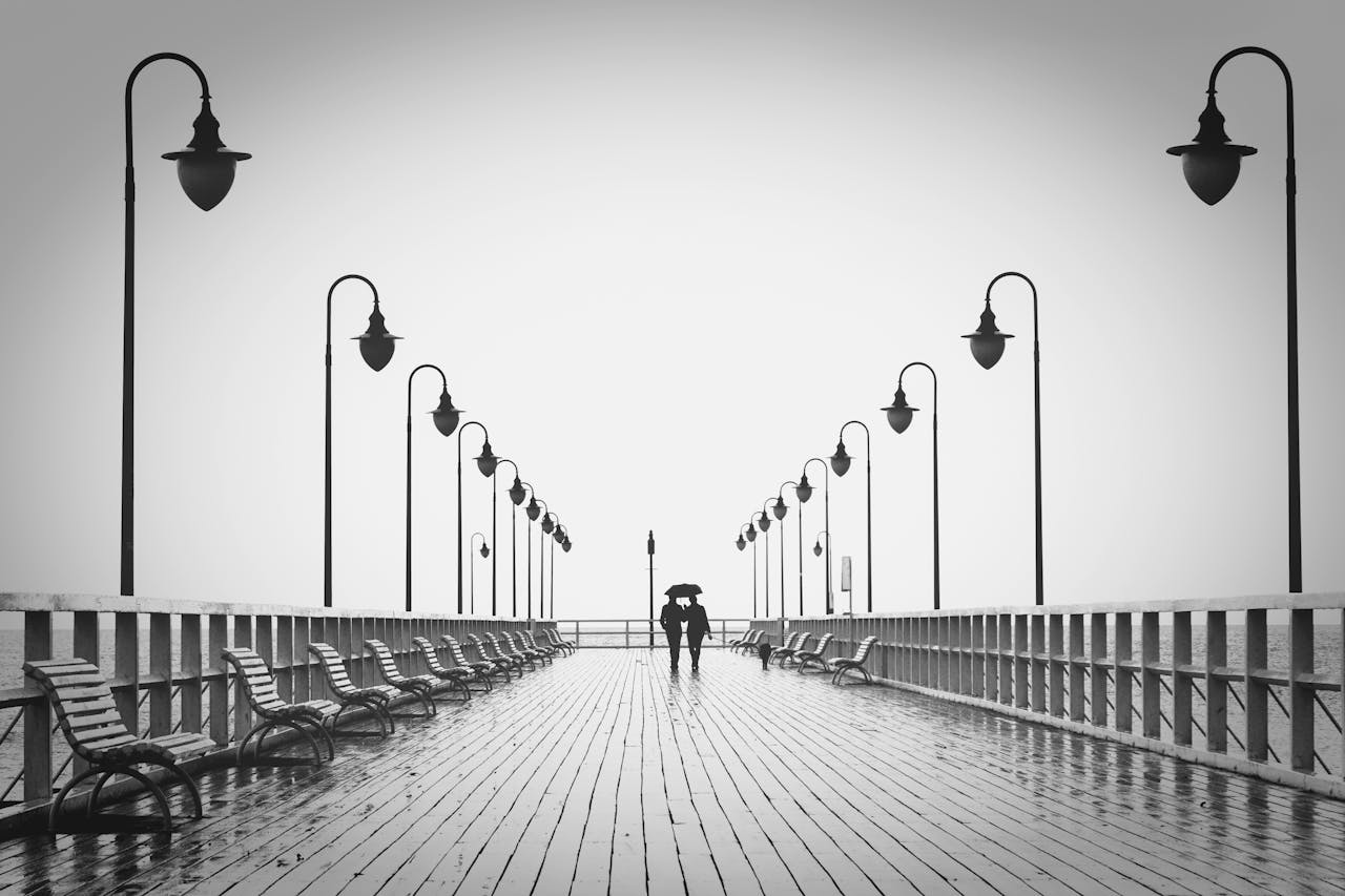 Photo by Pixabay: https://www.pexels.com/photo/two-people-walking-on-pier-220836/