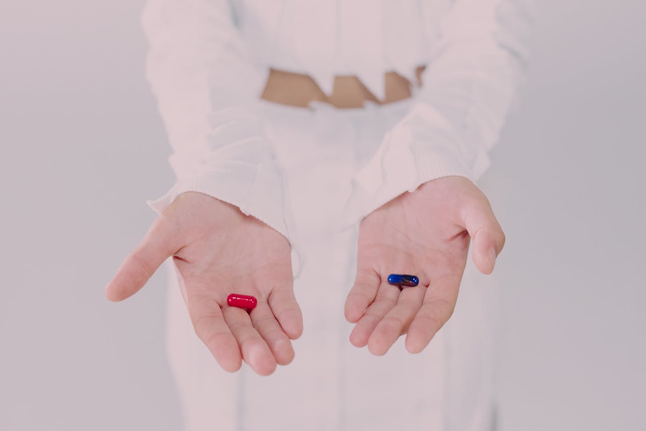 Photo by Ron Lach : https://www.pexels.com/photo/woman-holding-pills-9761339/