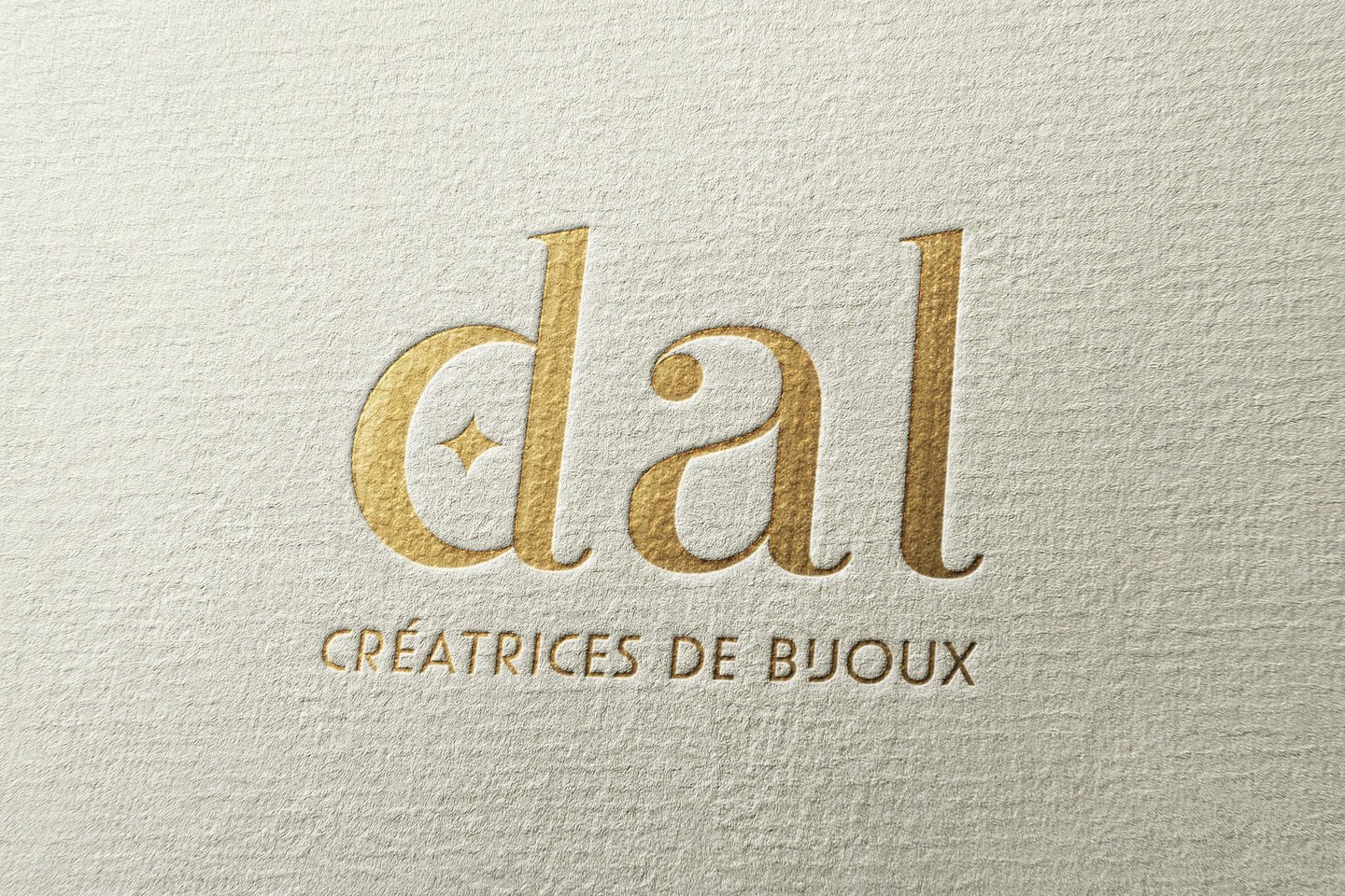Identité visuelle DAL Créations, application logo doré sur papeterie