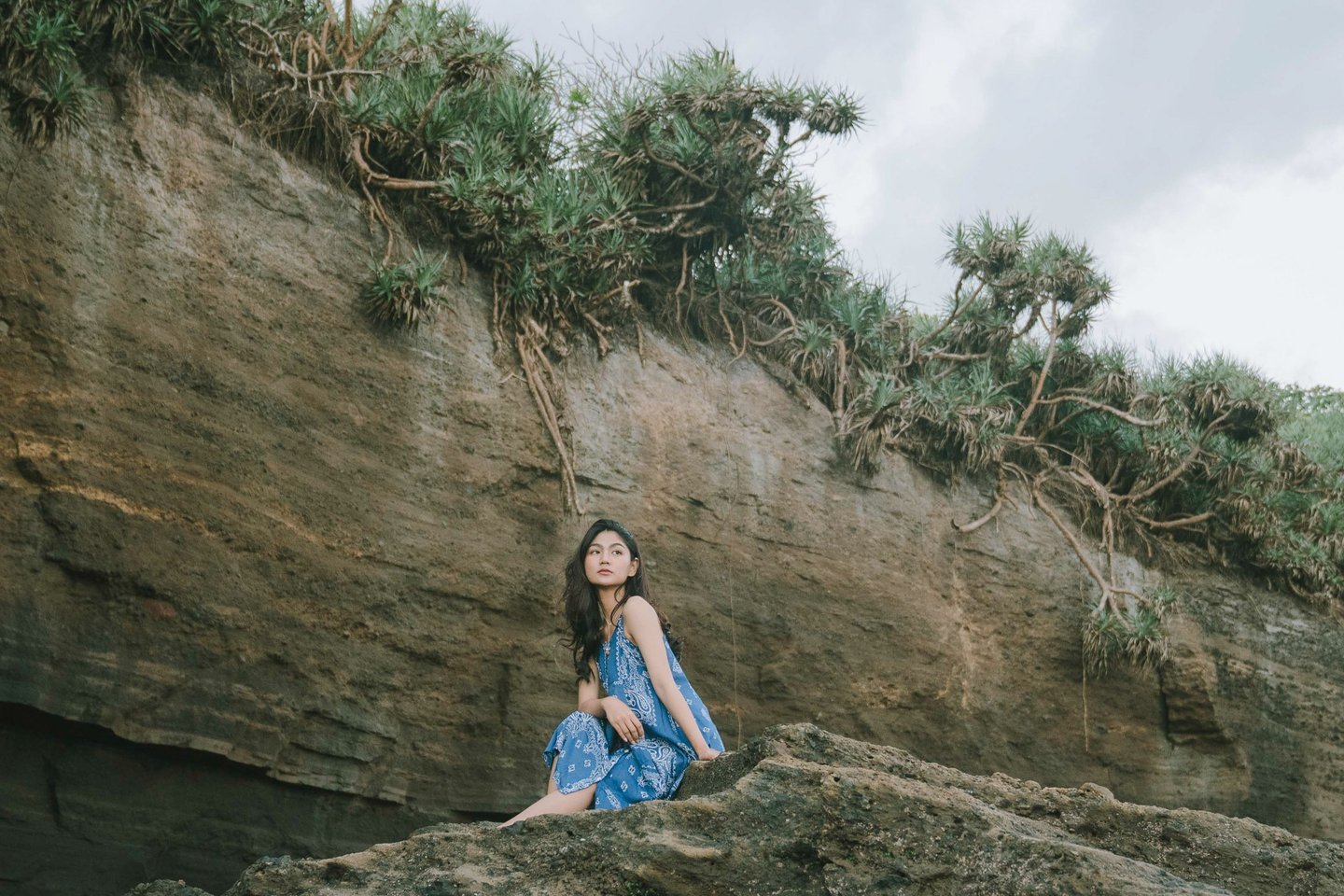 Lifestyle portrait with coastal landscape at Pantai Nyanyi Tabanan Bali