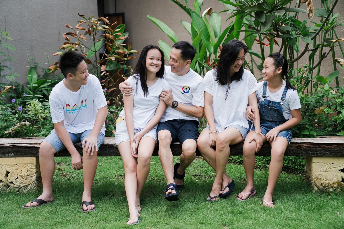 Candid family interaction during extended family photography at Lumbini Villas Jimbaran Bali with natural expressions