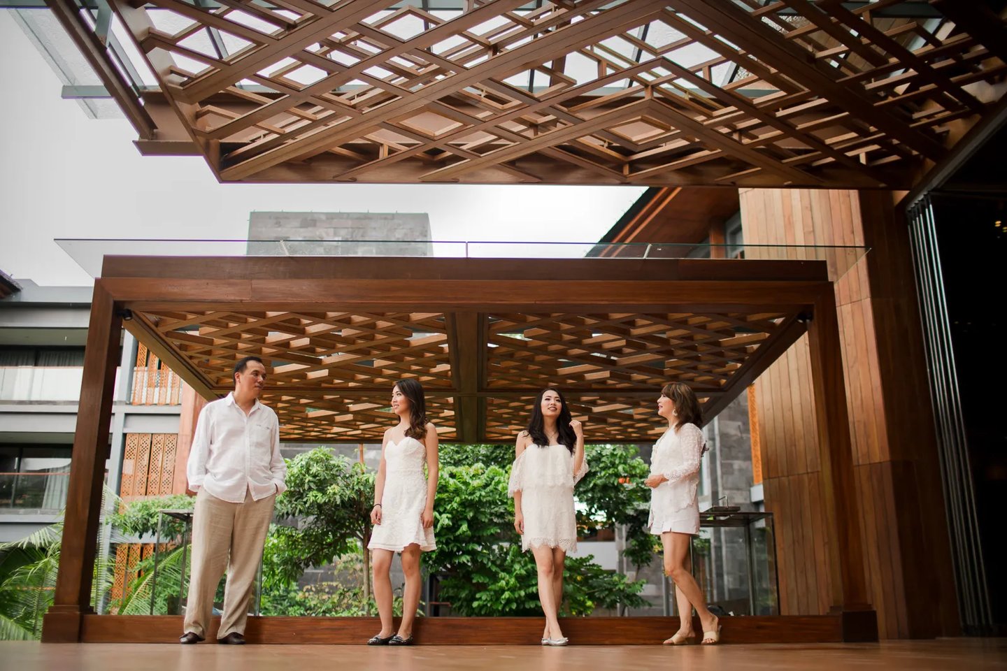 Janice family standing at the villa entrance during a family photography session at Indigo Seminyak Bali