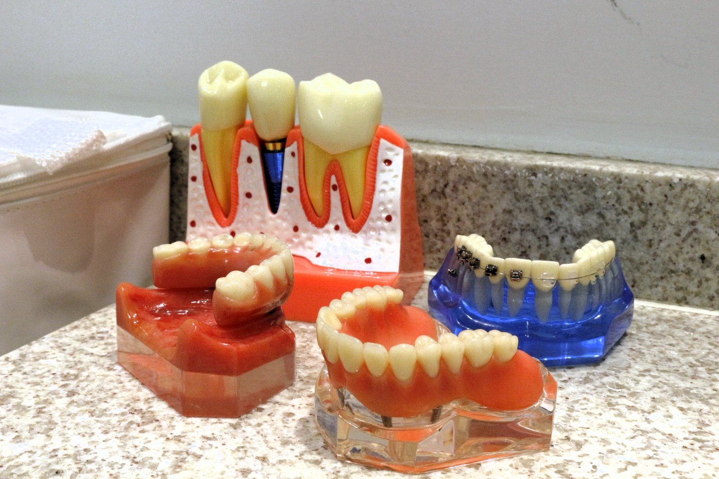 a toothbrush and dental care products on a counter