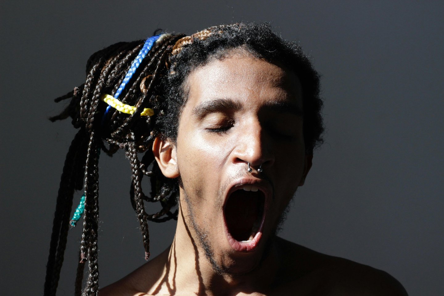 a man with dreadlocks and dreadlocks on his head