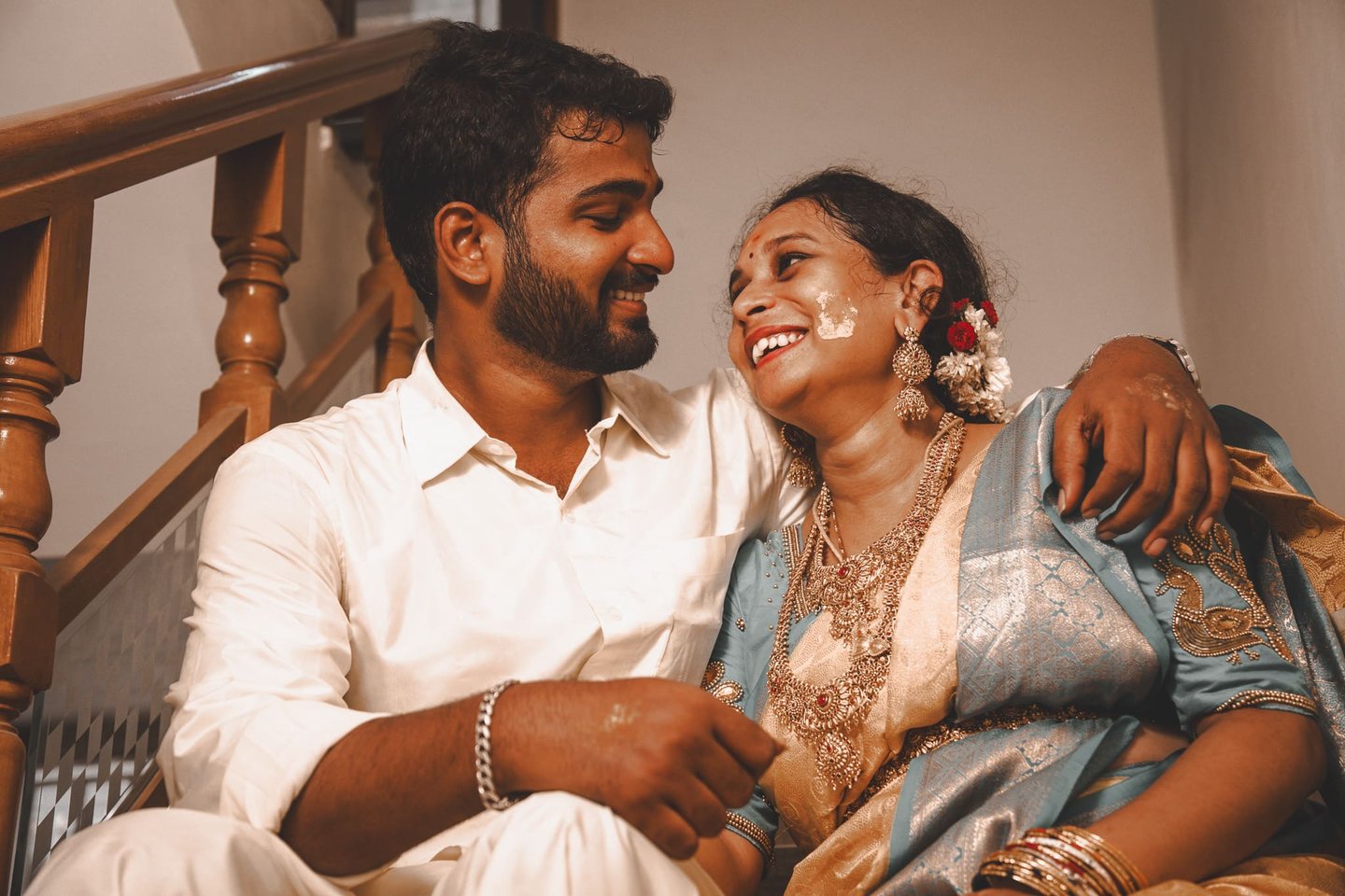 a man and woman sitting on a couch