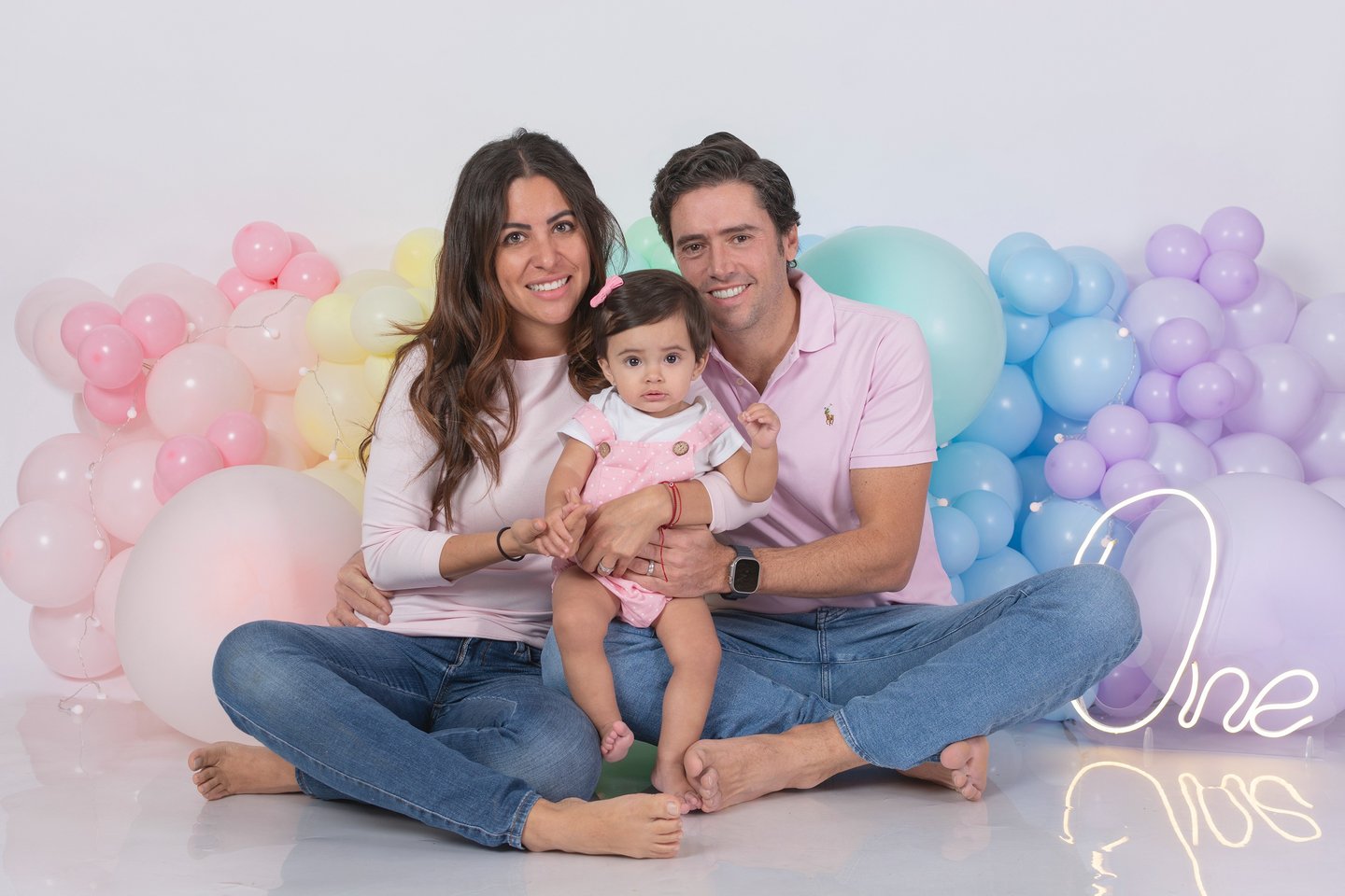 a baby boy in a circus themed birthday party