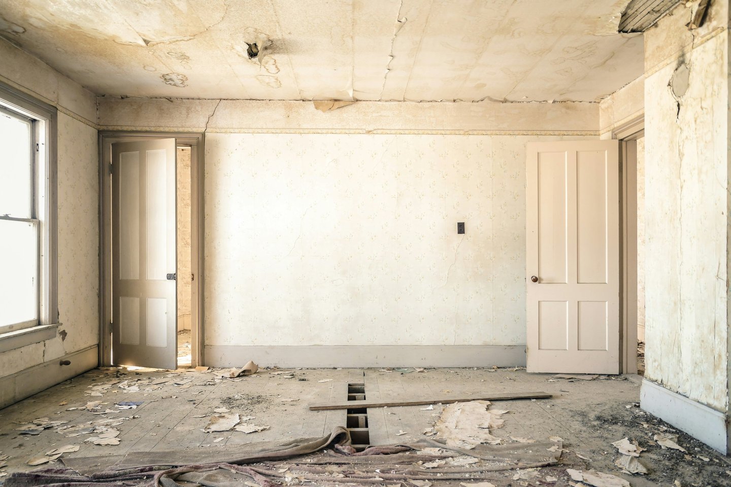 a room with a window and a door