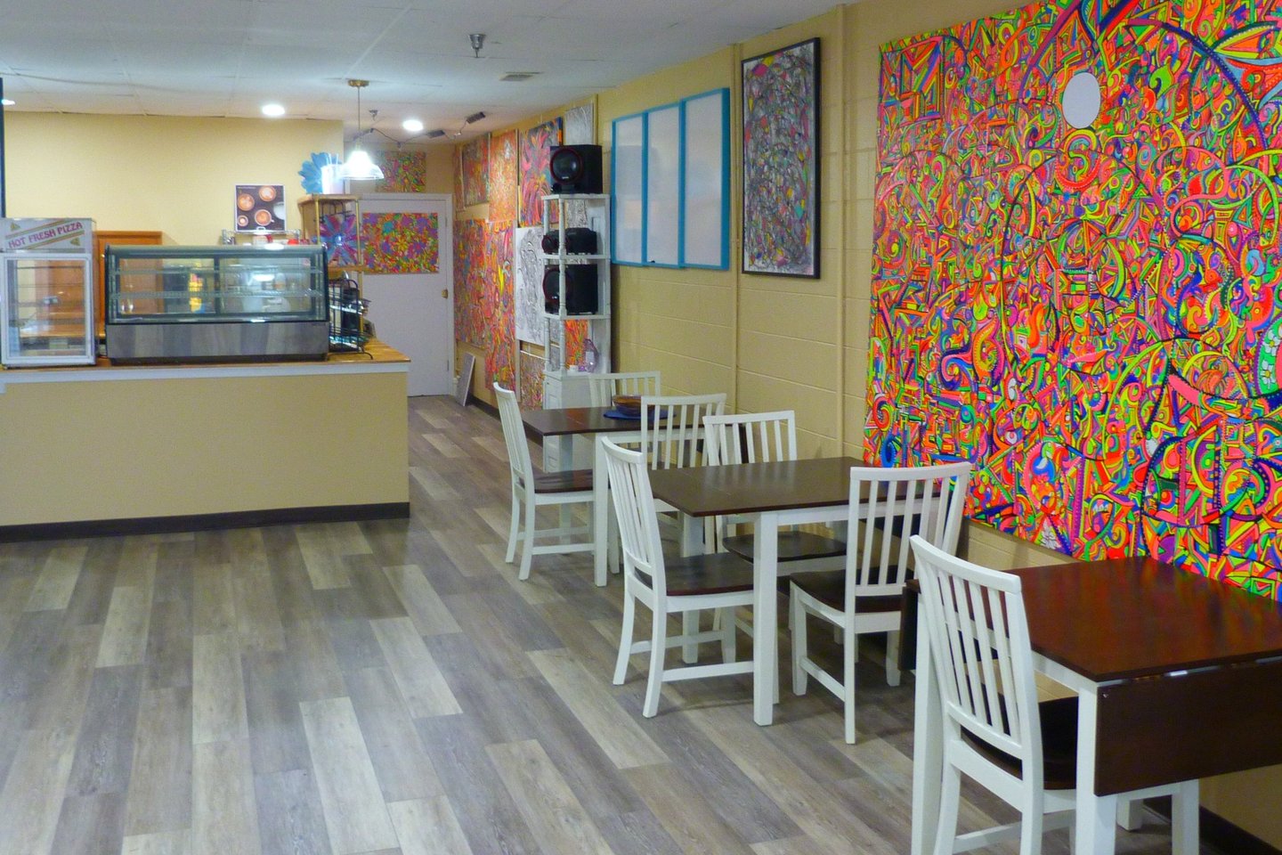 View of customer counter from just inside front door.