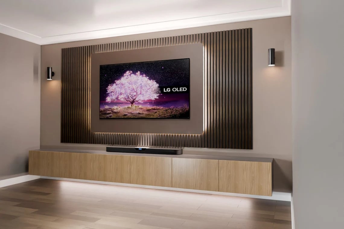 Custom-built illuminated media wall with integrated 4K TV installation by Mount My TV