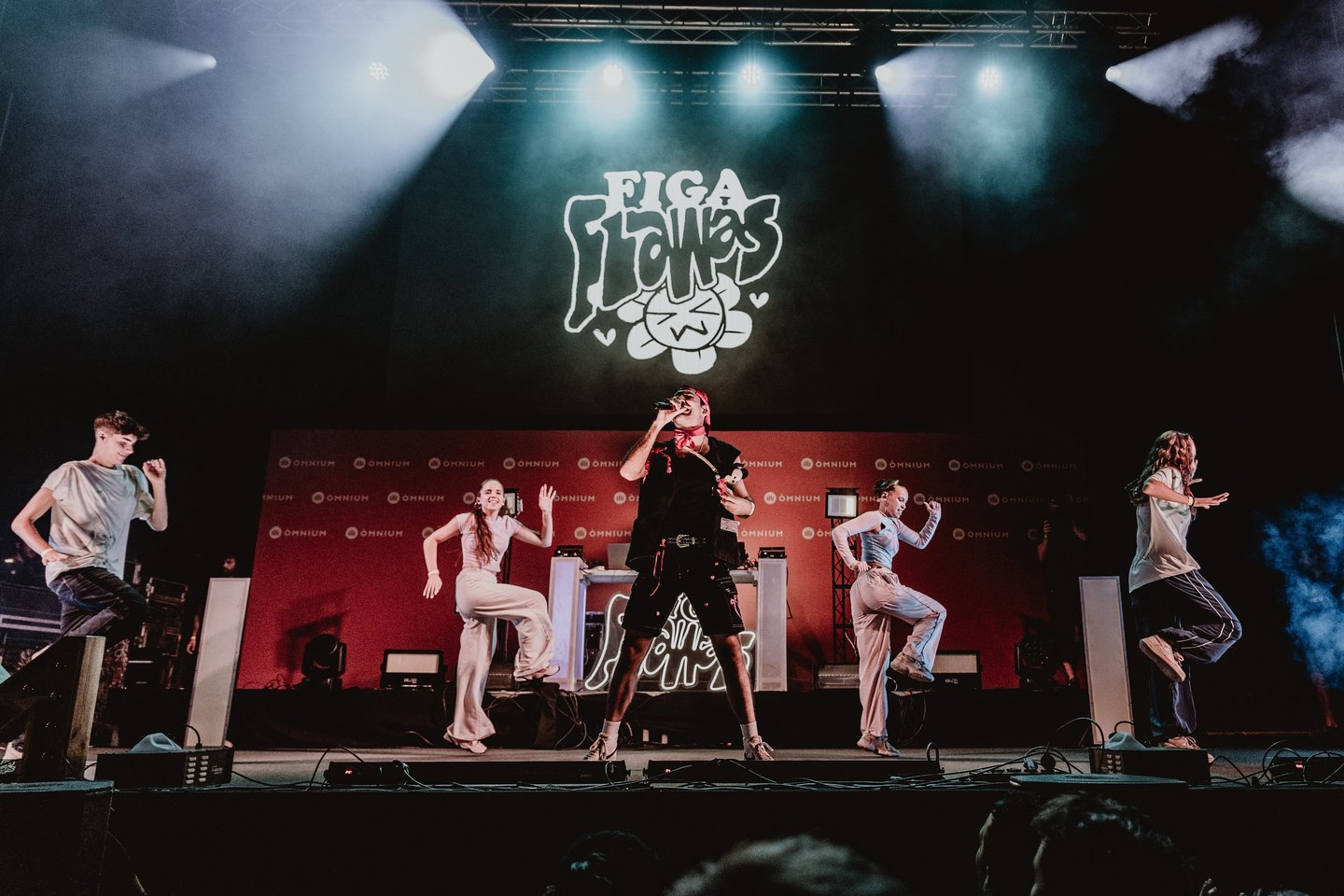 a group of people standing on a stage