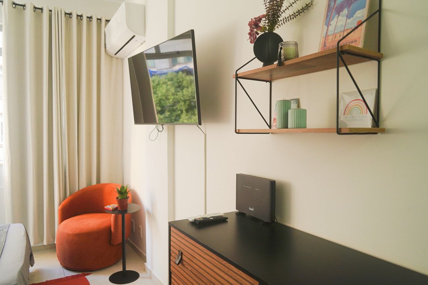 a television screen with a television and a chair