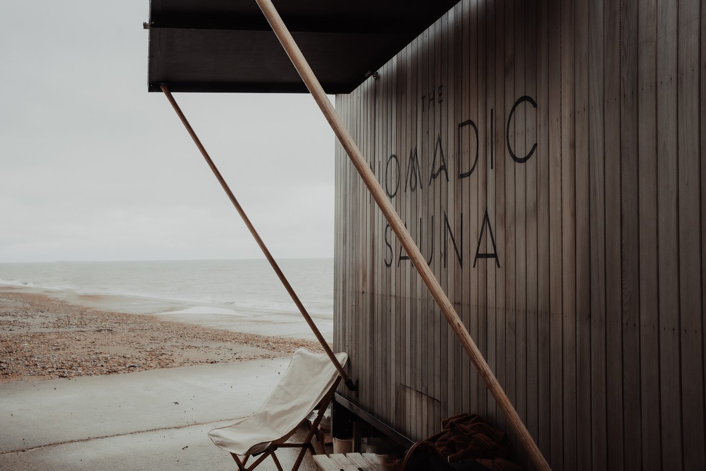 photo of wood fired nomadic sauna on the coast