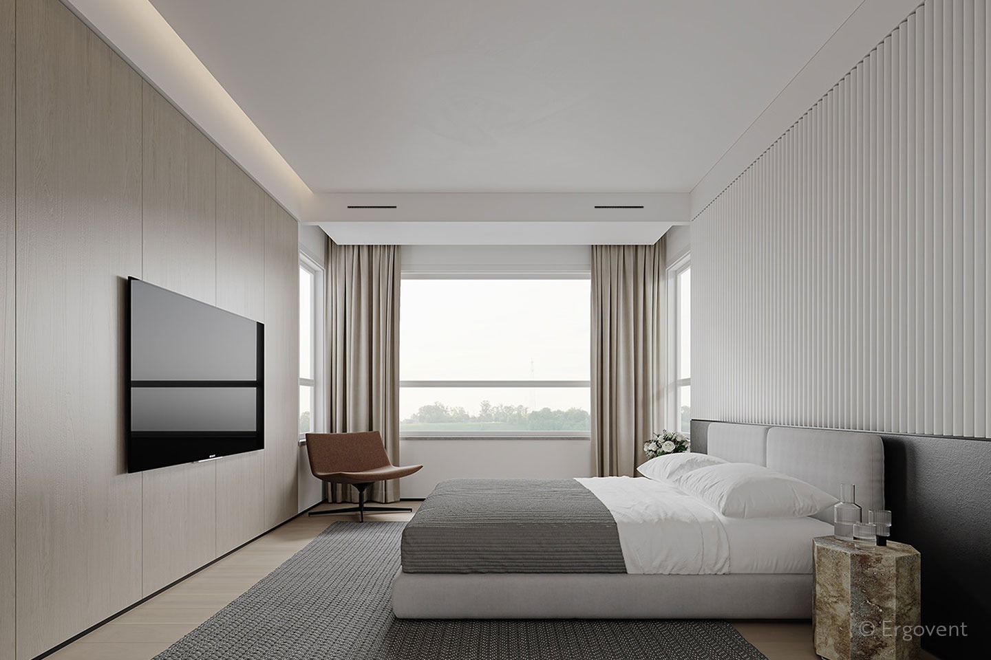 ERGOVENT LINEO-600 Profile Vertical linear diffuser installed in a modern hotel bedroom with neutral