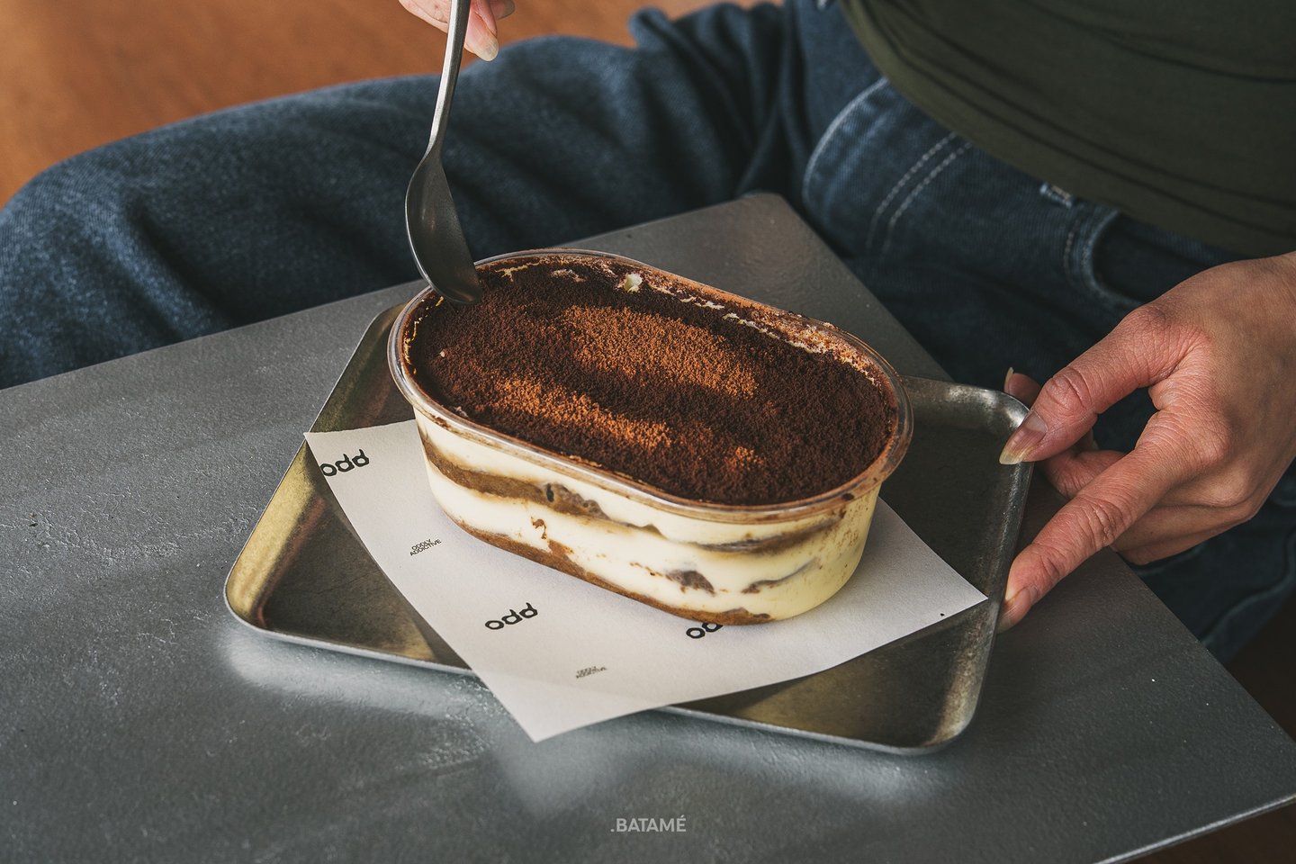 a large portion of tiramisu at odd Batam