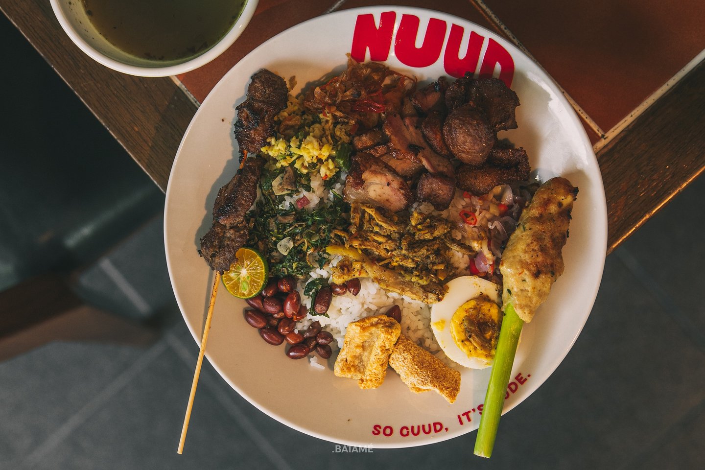 a plate of Nasi Babi Komplit called Nuud Komplit at NUUD Batam