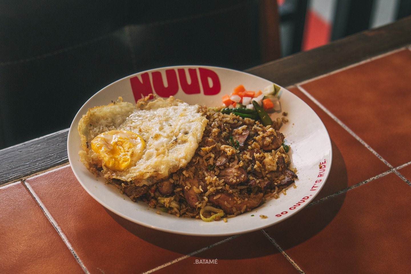 a plate of pork fried rice at NUUD Batam