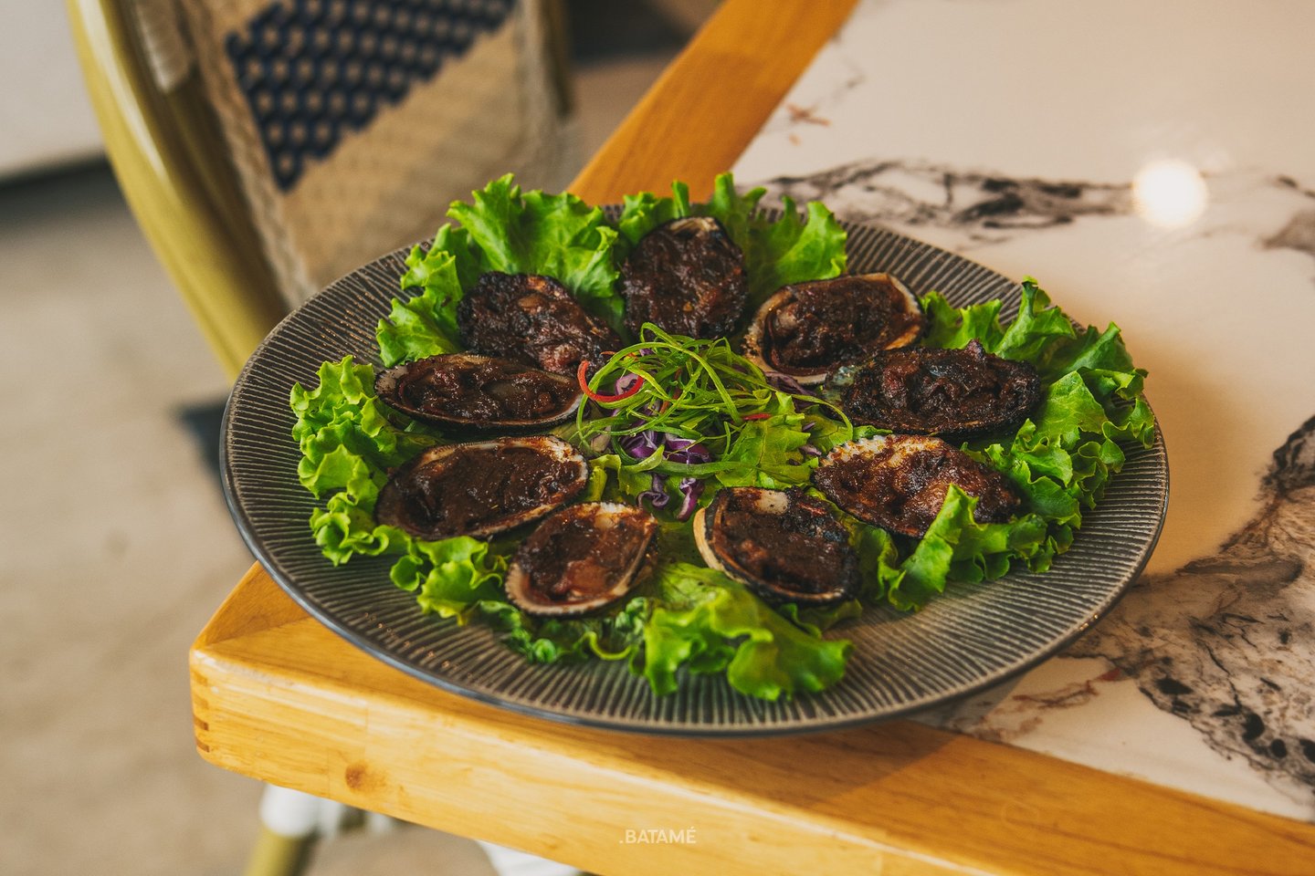 Blood cockles grilled in Jimbaran Sauce at SeeSea by Nomad Batam
