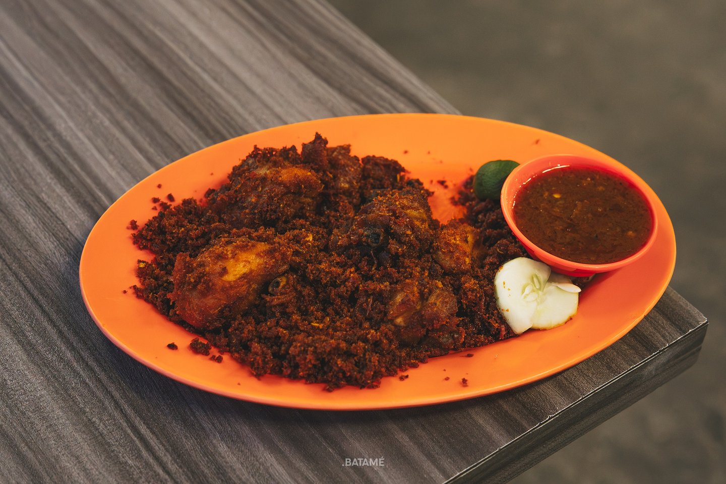 a plate of Ayam Goreng Bumbu at Johny Kopitiam Batam