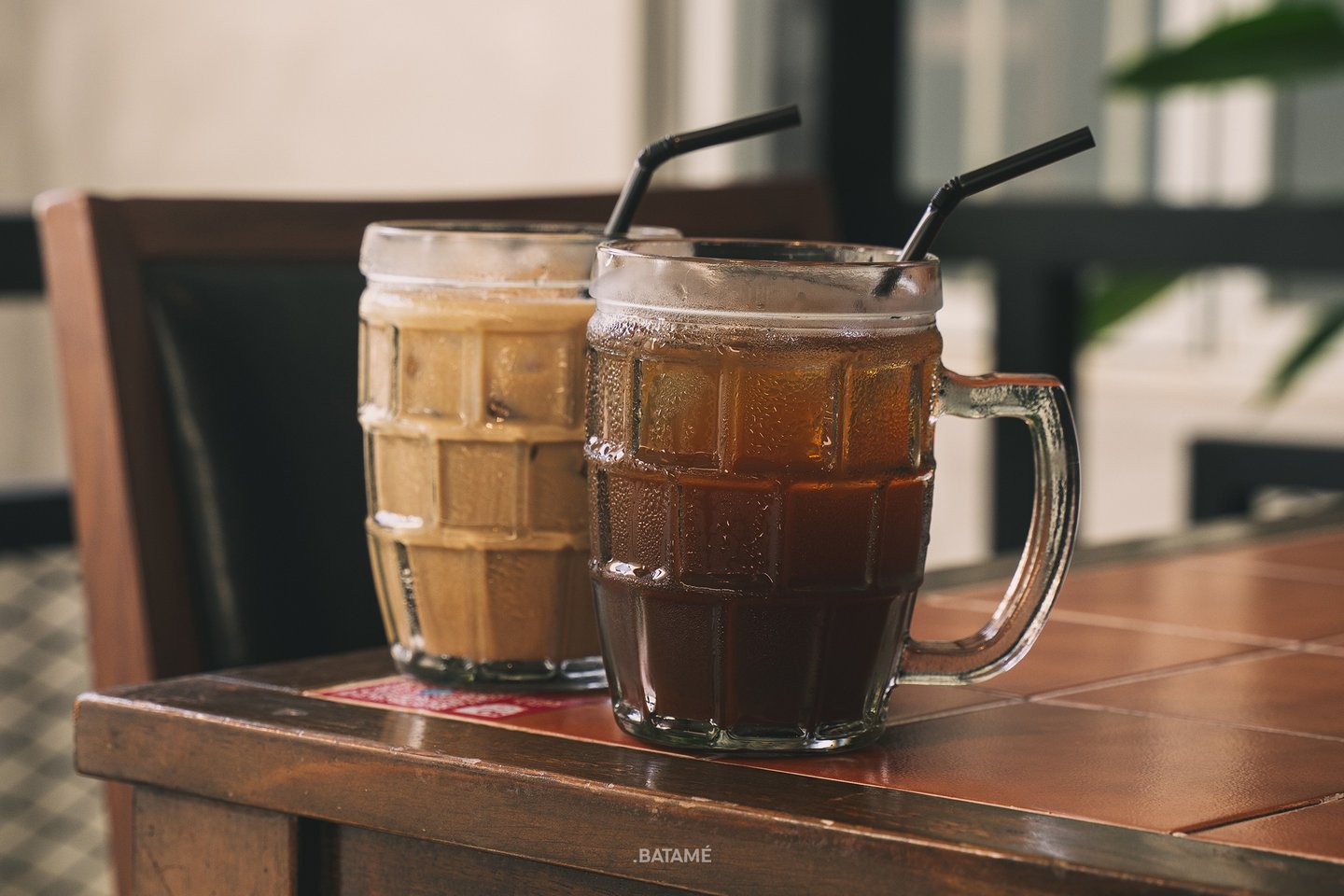 a cup of Ice Tea Asam Jawa and Ice Coffee at NUUD Batam