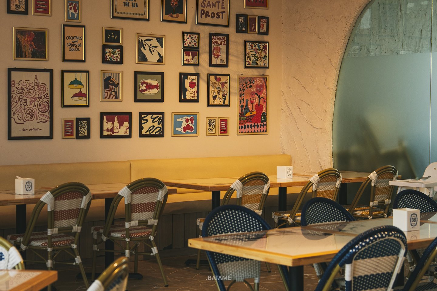 an interior with many art decors at SeeSea by Nomad Batam