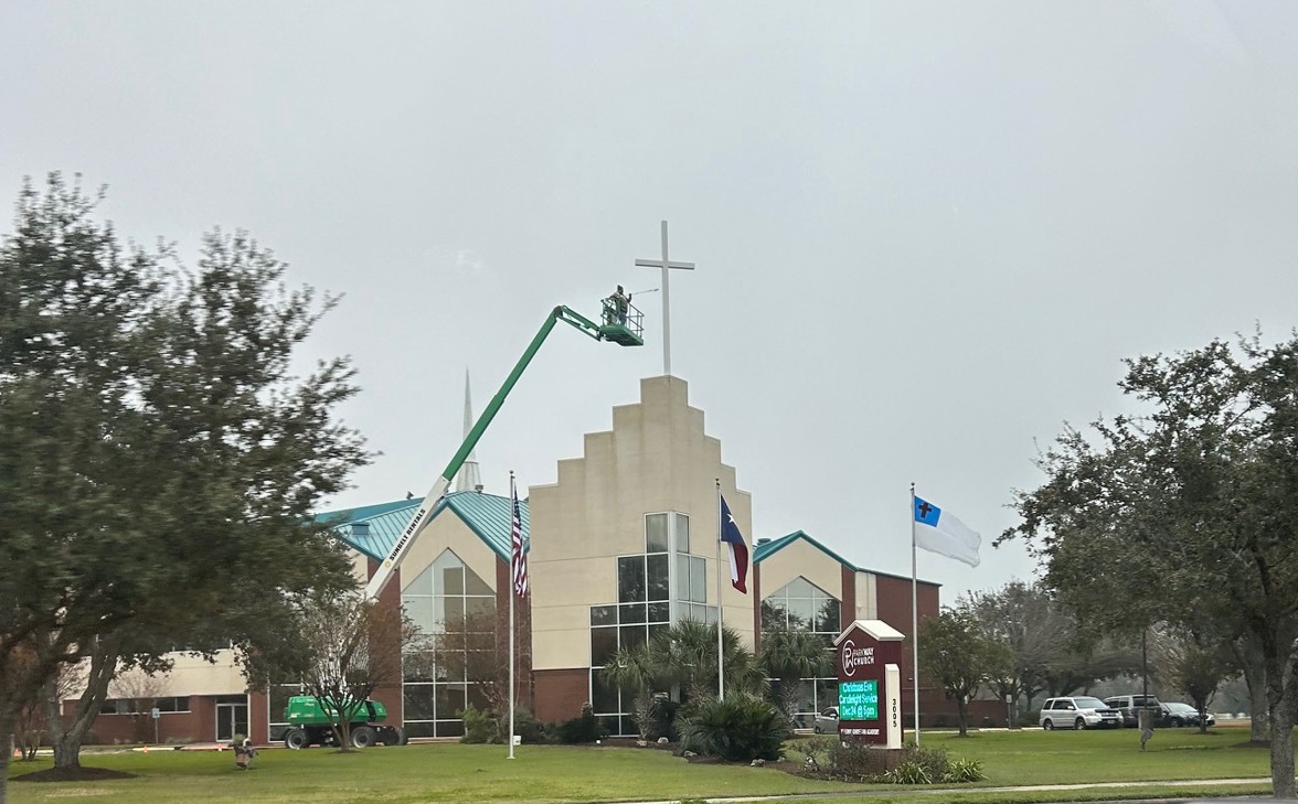 Roy Brothers of Texas Painting Church Cross