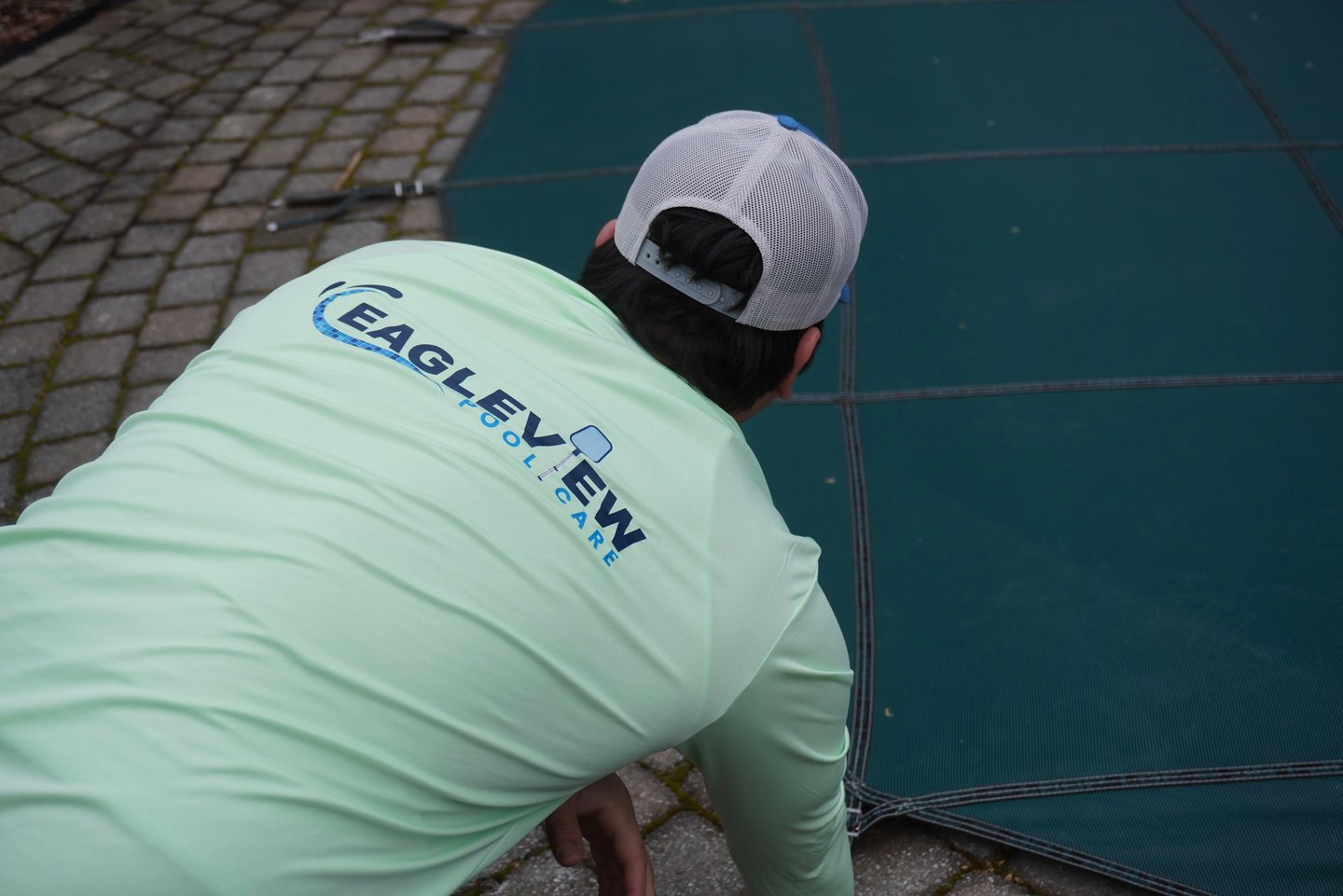 EagleView Pool Care technician performing expert pool maintenance in Connecticut