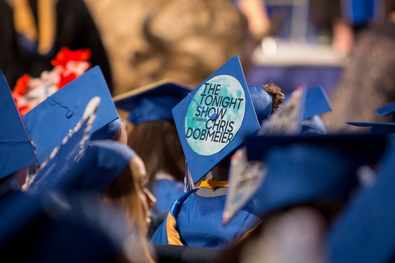 Chris Dobmeier's graduation cap - cap with a message on it