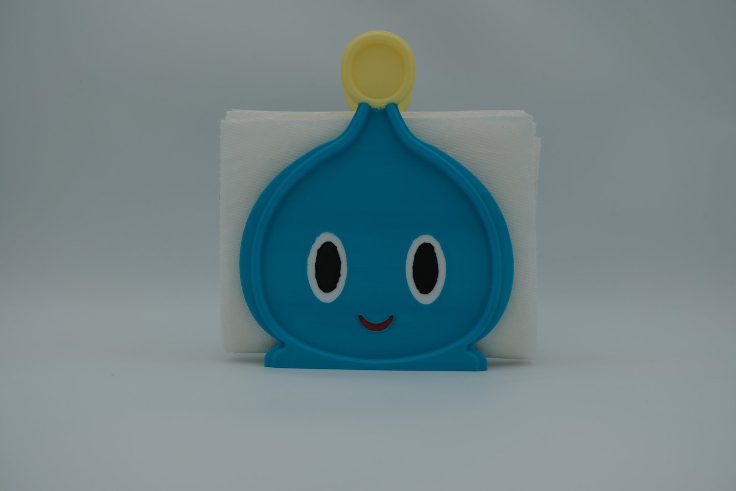 Blue Chao-inspired napkin holder with napkins, multicolor PLA