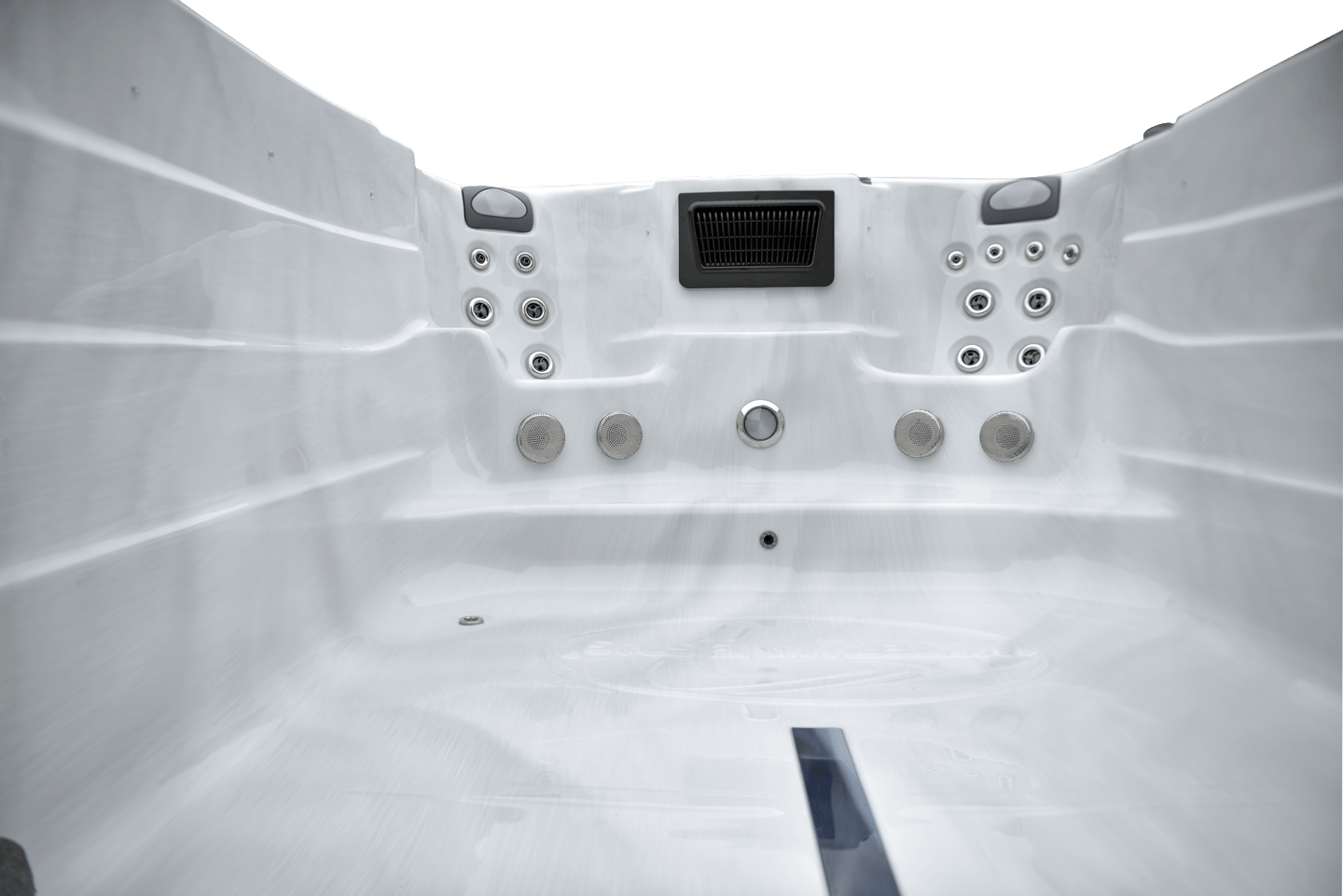a hot tub with a large white tub and a black and white tub