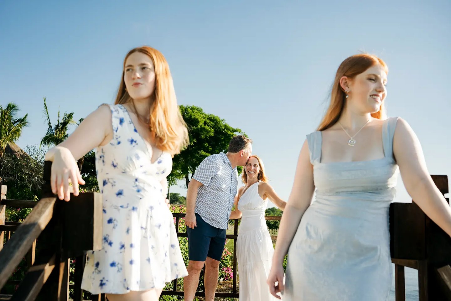 Sisters walking together during a relaxed family photography session at AYANA Resort Bali
