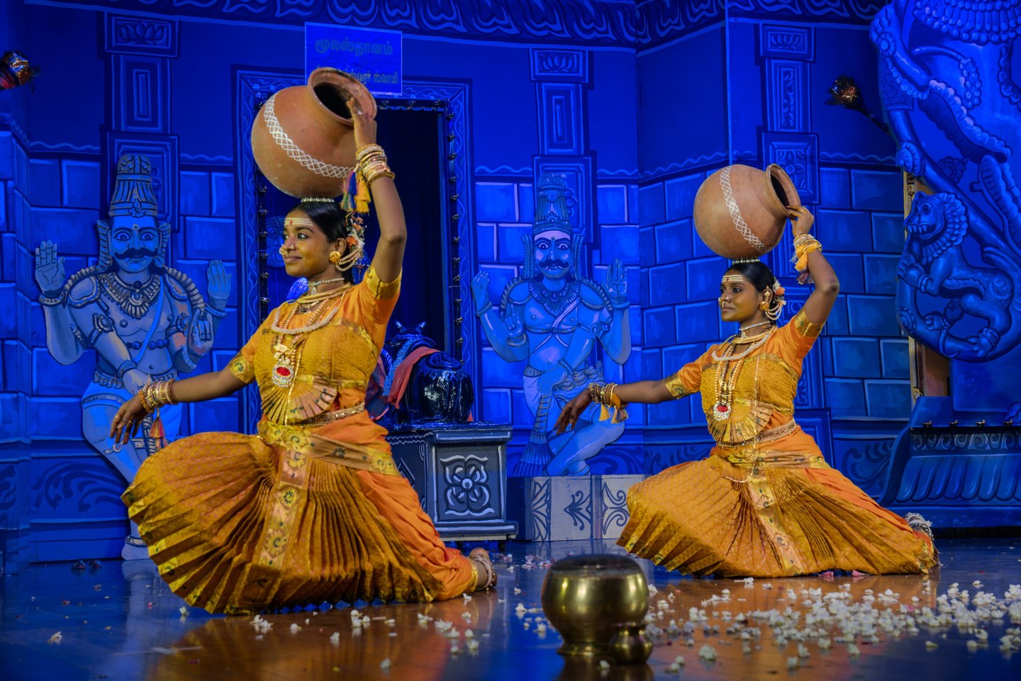Two women performing a classical Indian dance in traditional attire captured by Memories and More Ph