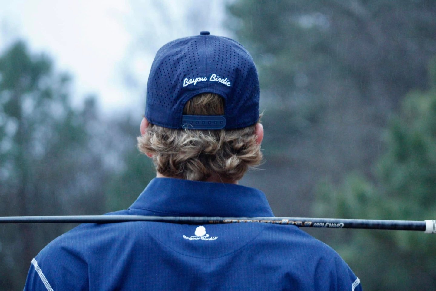 Navy Bayou Birdie Hat on Golfer