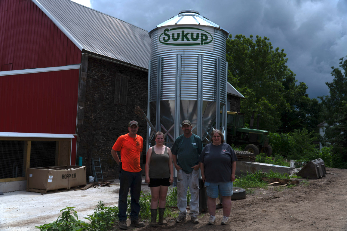 The Worthington Family with the Sukup grain bin