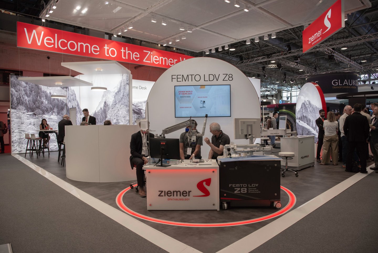 Messestand mit FEMTO LDV Z8-Laser für Live-Operationen auf einer Fachmesse.