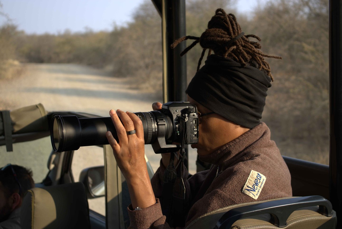 Guest on safari photographing iconic African wildlife