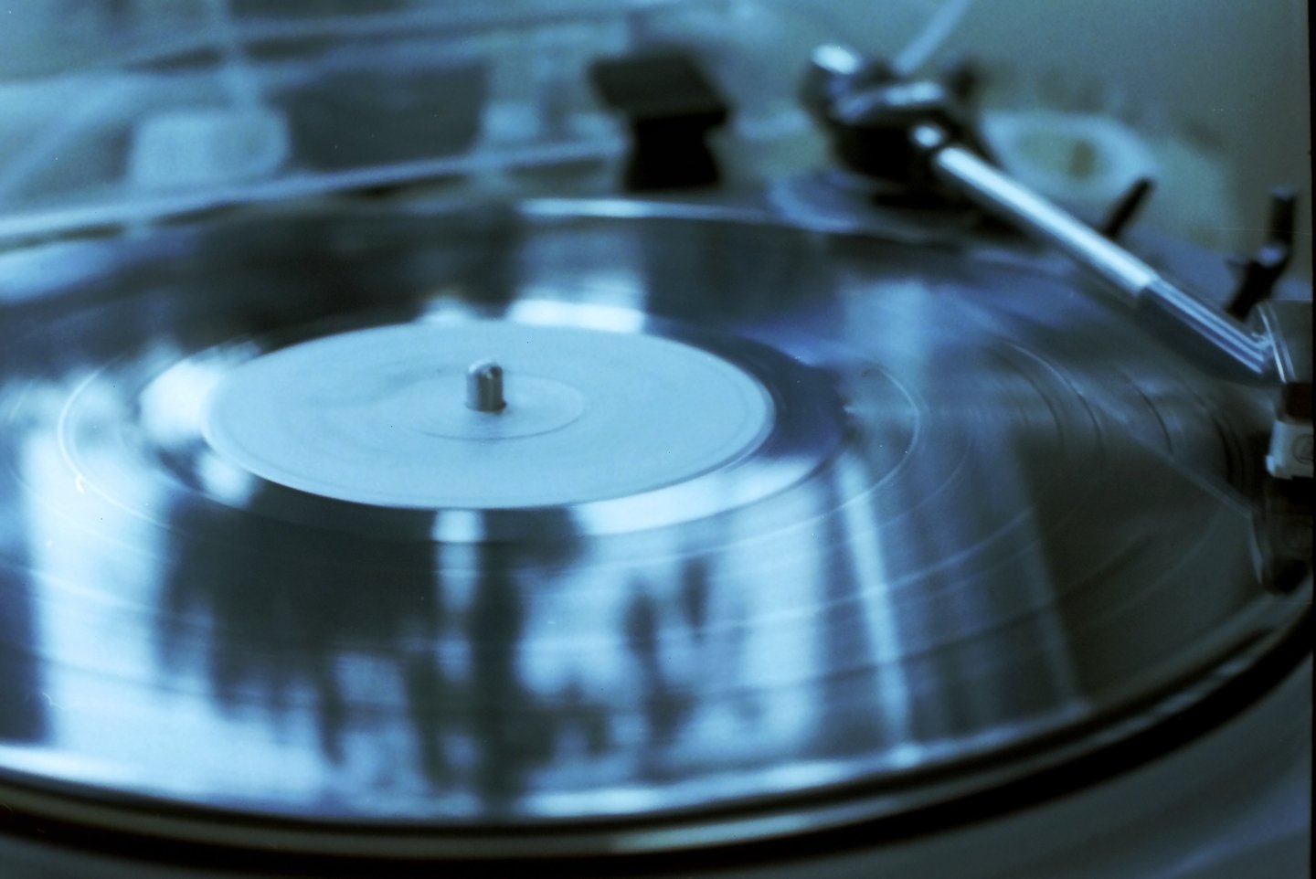 Image of a vinyl record in a turntable