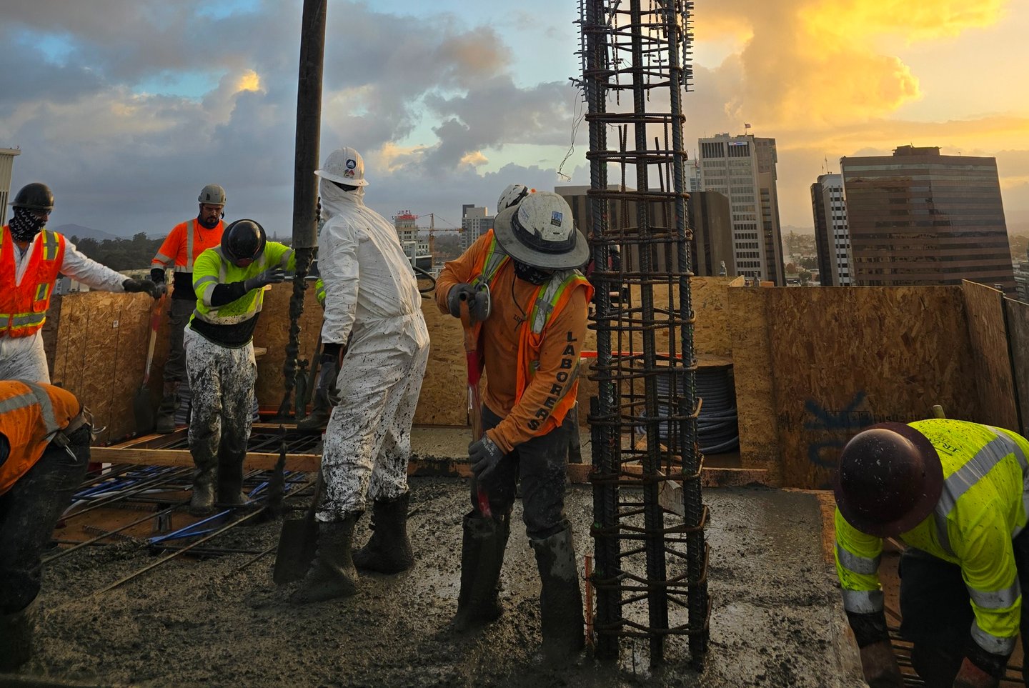 a group of men working on a construction site