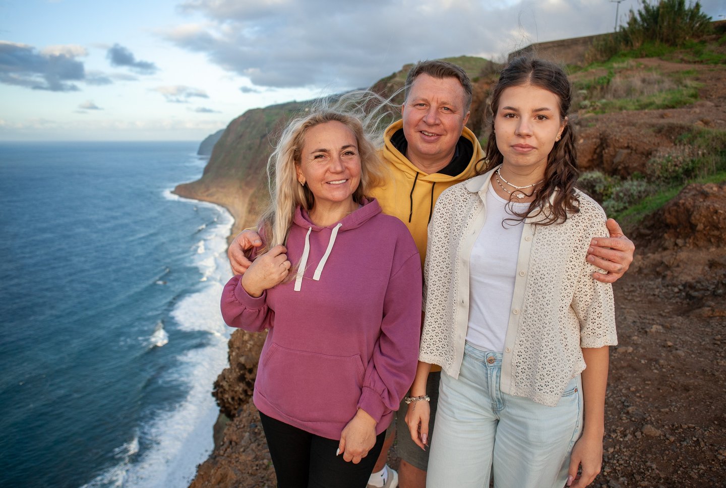 Family portrait at sunset photoshoot at Ponta do Pargo cliff edge Madeira